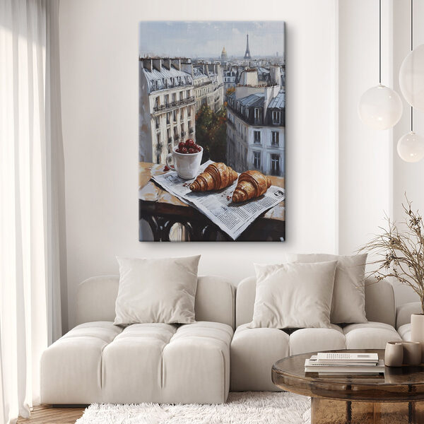 Tasse de café et croissants sur une table avec des bâtiments en arrière-plan Tableaux Tasse de café et croissants sur une table avec des bâtiments en arrière-plan