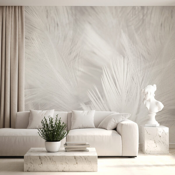 Papier peint Plumes blanches sur une surface blanche
