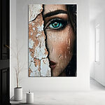 Tableaux Le visage d'une femme avec un mur fissuré