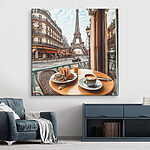 Tableaux Table sur laquelle se trouve une assiette de nourriture et une tasse de café