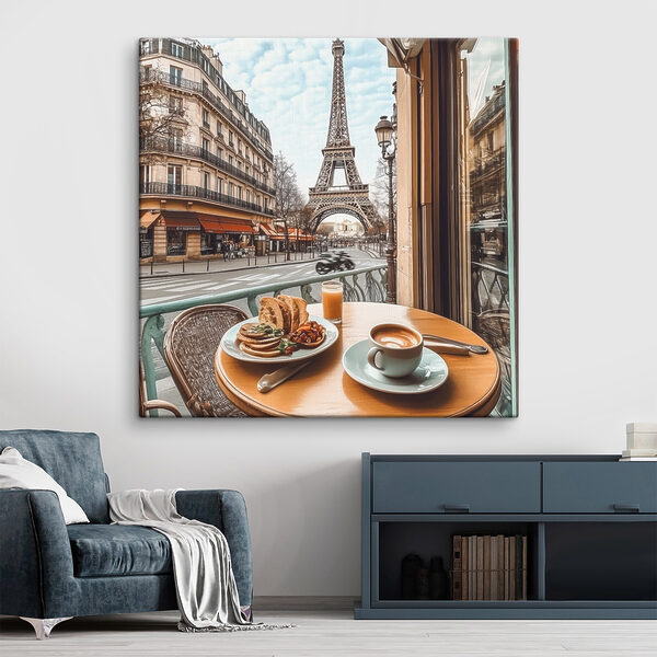 Table sur laquelle se trouve une assiette de nourriture et une tasse de café Tableaux Table sur laquelle se trouve une assiette de nourriture et une tasse de café