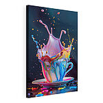 Tableaux Liquide coloré éclaboussant une tasse