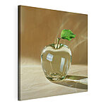 Tableaux Pomme en verre avec une feuille dessus