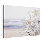 Tableaux Des fleurs blanches sur une plage
