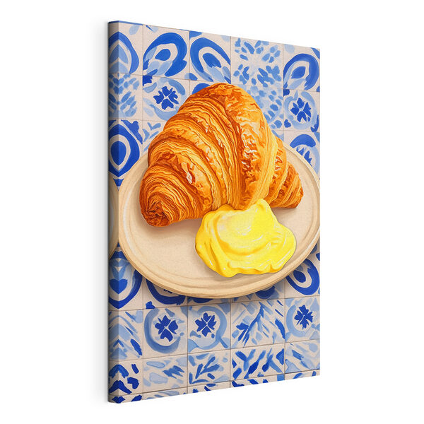 Un croissant et un liquide jaune dans une assiette Tableaux Un croissant et un liquide jaune dans une assiette