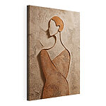 Tableaux Le visage d'une femme sculpté dans la pierre