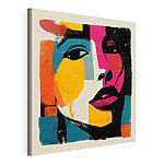 Tableaux Visage de femme recouvert de peinture colorée