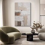Tableaux De la peinture blanche et marron sur un mur