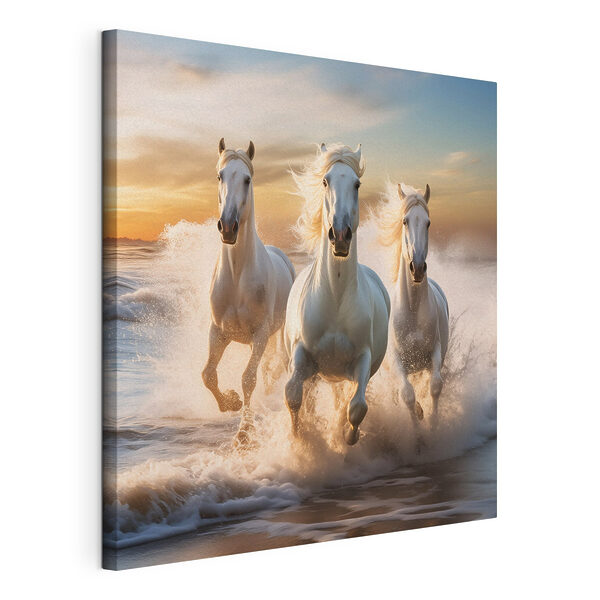 Tableaux Un groupe de chevaux blancs galopant sur une plage