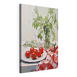 Tableaux Peinture représentant des tomates dans une assiette, à côté d'un vase rempli de feuilles vertes