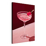 Tableaux Verre avec un liquide rose et deux cerises dessus