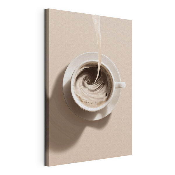 Tableaux Une tasse de café dans laquelle on verse du lait